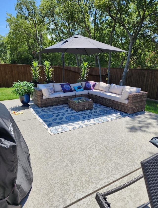 1803 Eastwood Ct, Mansfield, TX 76063 - fenced backyard with an outdoor living space with a fire pit and a patio