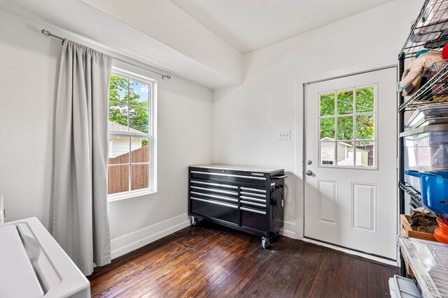 5533 Bonita Ave, Dallas, TX 75206 - doorway to outside featuring dark wood-type flooring, healthy amount of natural light, and baseboards