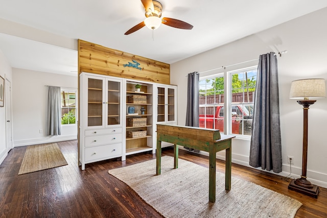 5533 Bonita Ave, Dallas, TX 75206 - office area with wood finished floors, ceiling fan, wood walls, and baseboards