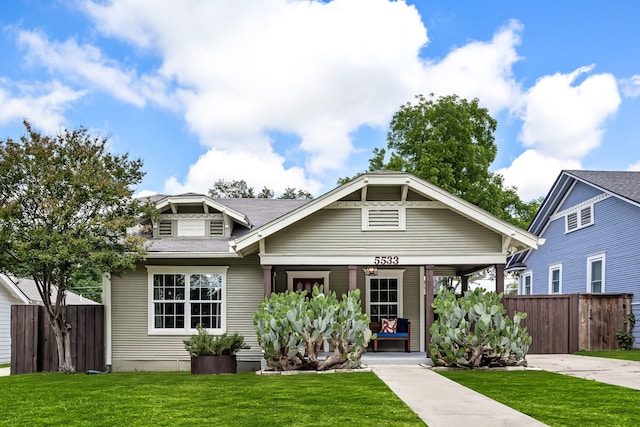 5533 Bonita Ave, Dallas, TX 75206 - view of front of home featuring a porch and roof with shingles