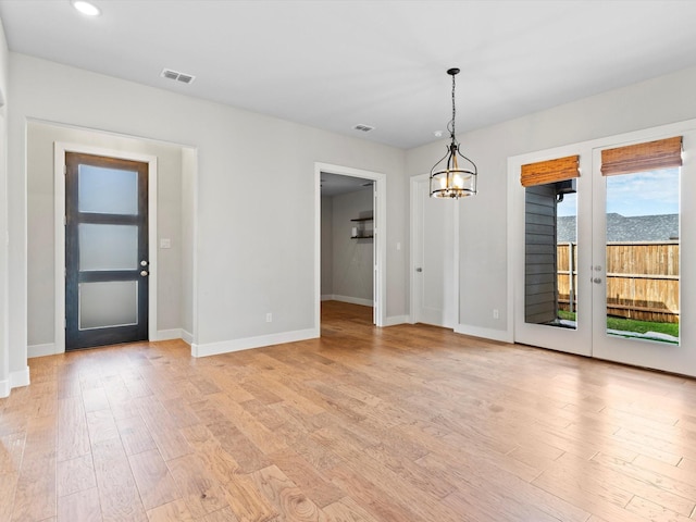 323 Green Meadow Dr, Little Elm, TX 75068 - unfurnished dining area with light wood-style floors, baseboards, and recessed lighting