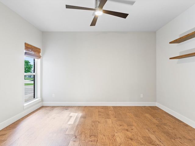 323 Green Meadow Dr, Little Elm, TX 75068 - empty room with light wood-style floors, baseboards, and ceiling fan