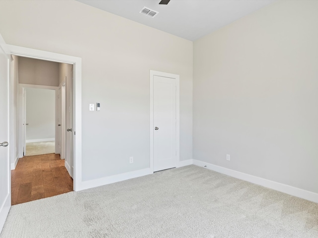 323 Green Meadow Dr, Little Elm, TX 75068 - unfurnished bedroom featuring carpet flooring, baseboards, and a ceiling fan