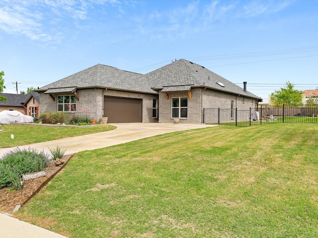 323 Green Meadow Dr, Little Elm, TX 75068 - view of front of house with brick siding, an attached garage, roof with shingles, and driveway
