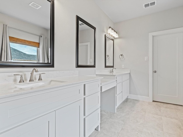 323 Green Meadow Dr, Little Elm, TX 75068 - bathroom featuring double vanity and baseboards