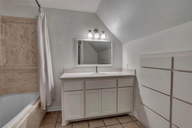full bath featuring vaulted ceiling, tile patterned flooring, vanity, and shower / bath combination with curtain
