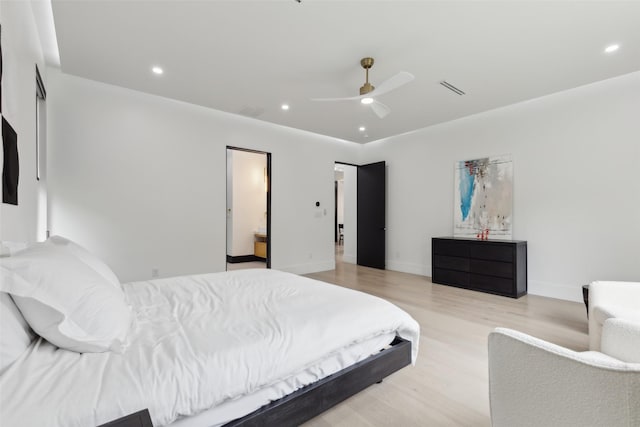 bedroom with wood finished floors, recessed lighting, a ceiling fan, and baseboards
