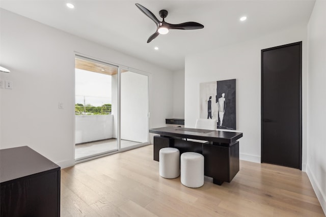 unfurnished office featuring light wood-style floors, ceiling fan, recessed lighting, and baseboards