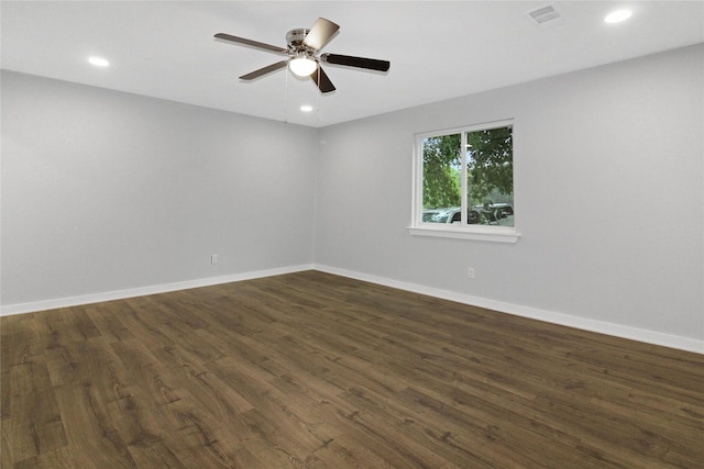 14590 Coffee Ln, Scurry, TX 75158 - spare room featuring dark wood-type flooring, ceiling fan, baseboards, and recessed lighting