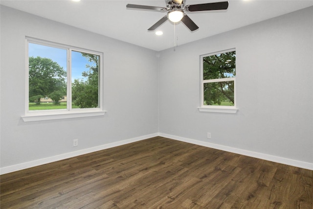 14590 Coffee Ln, Scurry, TX 75158 - spare room with plenty of natural light, recessed lighting, baseboards, and dark wood finished floors