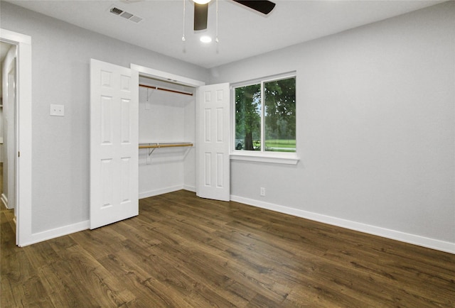 14590 Coffee Ln, Scurry, TX 75158 - unfurnished bedroom with baseboards, dark wood-style floors, a closet, and ceiling fan