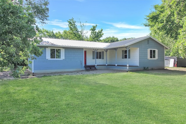 14590 Coffee Ln, Scurry, TX 75158 - ranch-style house featuring a porch, a front lawn, and metal roof