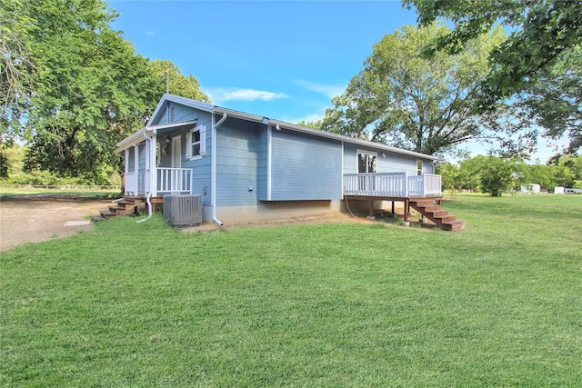 14590 Coffee Ln, Scurry, TX 75158 - back of property featuring a yard, cooling unit, a wooden deck, and stairs
