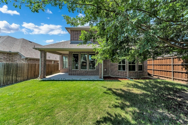 5112 Fringetree Dr, Mckinney, TX 75071 - back of property with brick siding and a patio