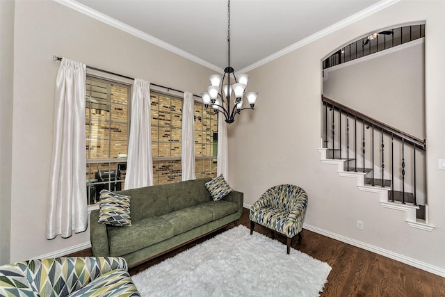 5112 Fringetree Dr, Mckinney, TX 75071 - living area featuring a chandelier, wood finished floors, crown molding, baseboards, and stairway