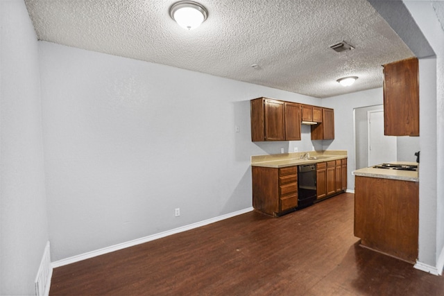 6708 S Creek Dr, Fort Worth, TX 76133 - kitchen with dishwasher, dark wood finished floors, a textured ceiling, light countertops, and baseboards