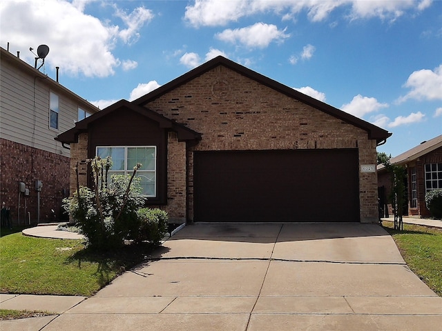 6025 Melanie Dr, Fort Worth, TX 76131 - ranch-style house with concrete driveway, brick siding, and a garage