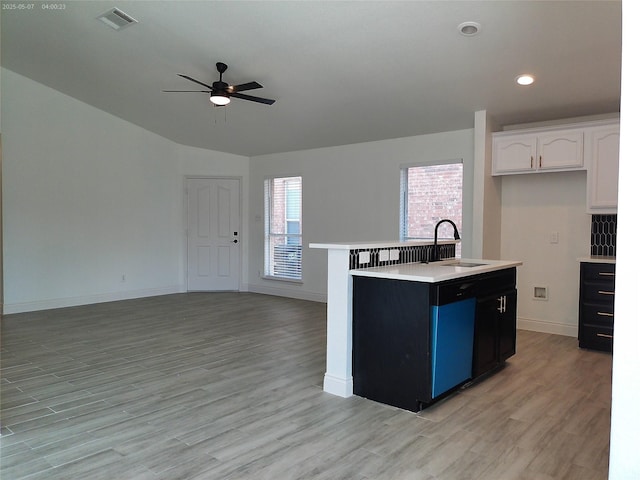 6025 Melanie Dr, Fort Worth, TX 76131 - kitchen featuring a sink, open floor plan, a ceiling fan, light wood-style floors, and recessed lighting