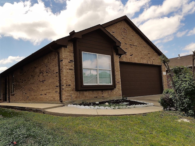 6025 Melanie Dr, Fort Worth, TX 76131 - view of property exterior featuring a garage, concrete driveway, a yard, and brick siding