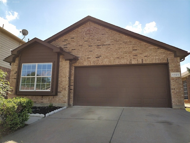 6025 Melanie Dr, Fort Worth, TX 76131 - ranch-style home featuring a garage, driveway, and brick siding