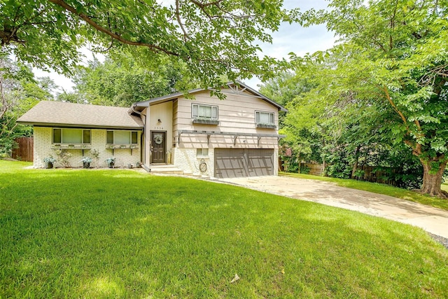 3554 Cromart Ct N, Fort Worth, TX 76133 - split level home featuring a garage, driveway, and brick siding