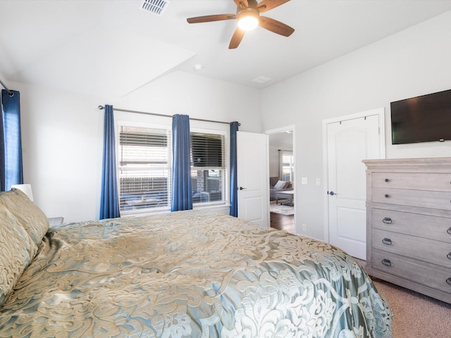 carpeted bedroom with a ceiling fan