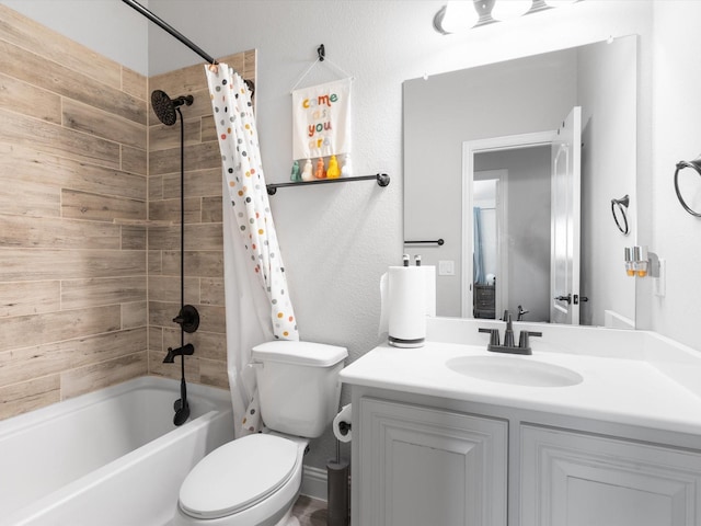 bathroom featuring shower / bath combination with curtain, vanity, and toilet
