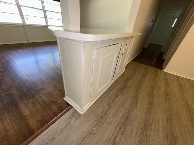 detailed view of wood finished floors and baseboards