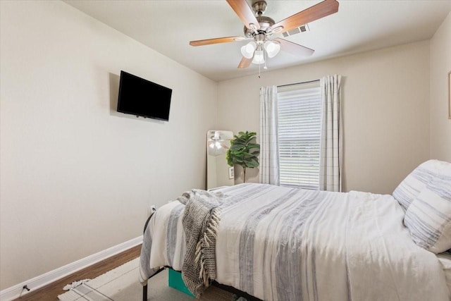 401 Mahon Hollow Dr, Waco, TX 76704 - bedroom featuring baseboards, wood finished floors, and a ceiling fan