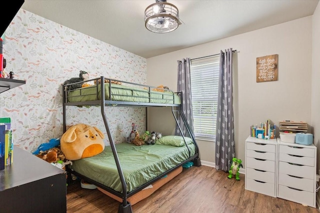401 Mahon Hollow Dr, Waco, TX 76704 - bedroom with wood finished floors, baseboards, and wallpapered walls