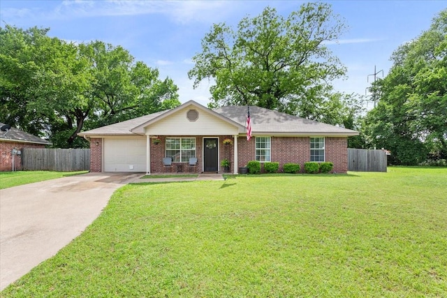 401 Mahon Hollow Dr, Waco, TX 76704 - single story home with an attached garage, driveway, and brick siding