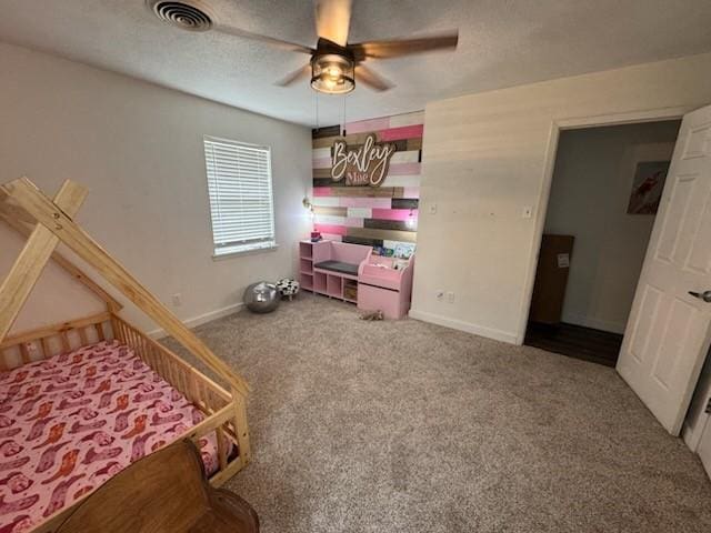 261 Barker St, Stephenville, TX 76401 - carpeted bedroom featuring baseboards and ceiling fan