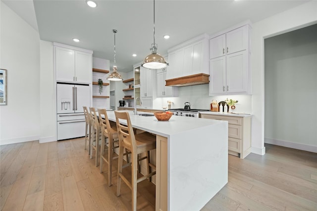 4541 Walnut Grove Ln, Prosper, TX 75078 - kitchen featuring high end white fridge, open shelves, baseboards, light countertops, and recessed lighting