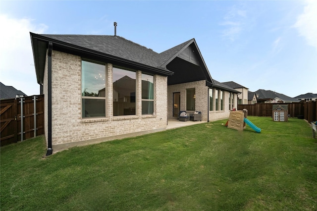 4541 Walnut Grove Ln, Prosper, TX 75078 - rear view of property with brick siding, a patio, and a shingled roof