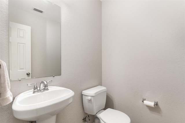1915 Fairway Crossing Rd, Wylie, TX 75098 - half bathroom with a sink and toilet
