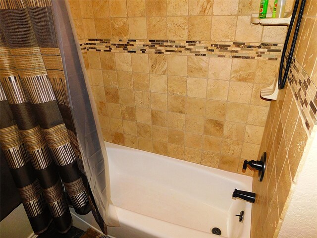 full bathroom with shower / bath combo