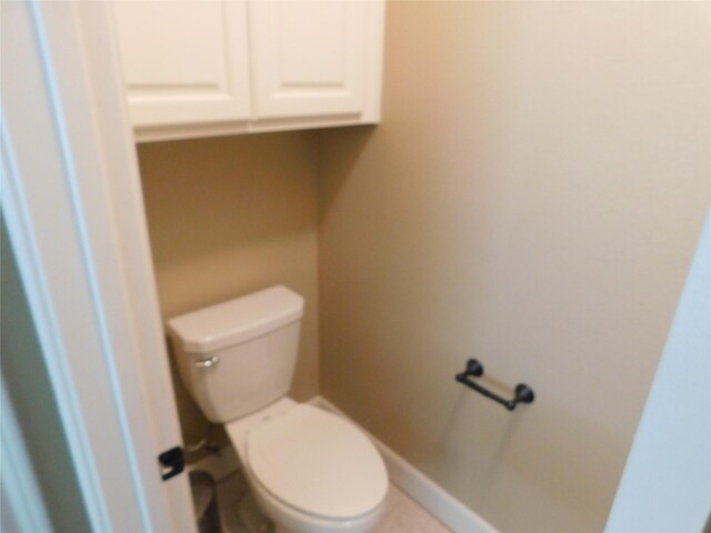 bathroom featuring toilet