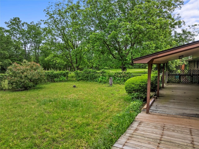 979 Rockdale, Sulphur Springs, TX 75482 - view of green lawn with a deck