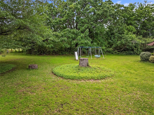 979 Rockdale, Sulphur Springs, TX 75482 - view of grassy yard with a playground