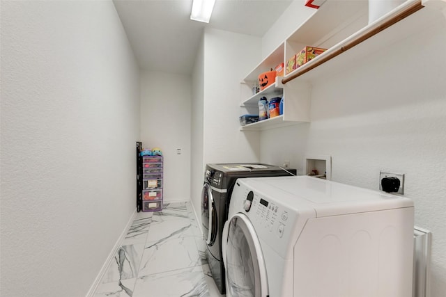 305 Blythe Bridge Dr, Roanoke, TX 76262 - laundry room with light marble finish flooring, washer and dryer, and baseboards