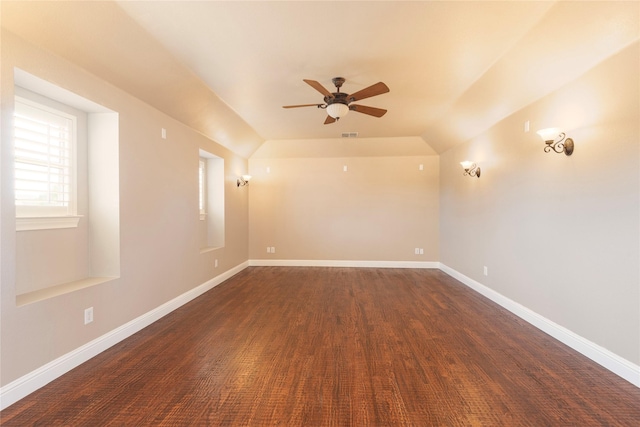 4016 Muscovy Dr, Mckinney, TX 75072 - empty room with ceiling fan, vaulted ceiling, baseboards, and dark wood finished floors