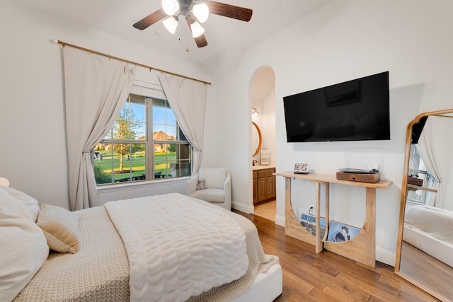 308 Pioneer Ct, Mclendon Chisholm, TX 75032 - bedroom featuring wood finished floors, baseboards, ensuite bathroom, and a ceiling fan
