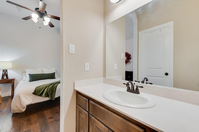 308 Pioneer Ct, Mclendon Chisholm, TX 75032 - bathroom featuring wood finished floors, ceiling fan, and vanity