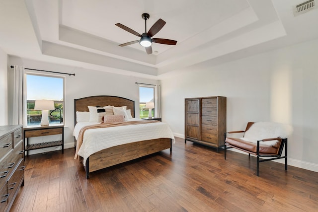 308 Pioneer Ct, Mclendon Chisholm, TX 75032 - bedroom featuring a raised ceiling, dark wood-style floors, baseboards, and ceiling fan
