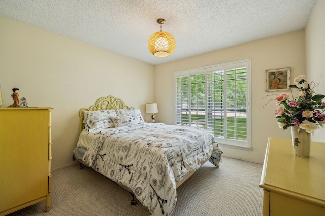 614 Willowbrook Cir, Duncanville, TX 75116 - bedroom with carpet flooring and a textured ceiling