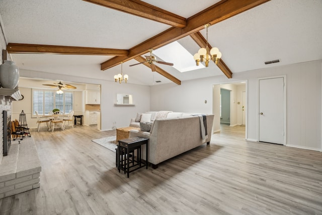614 Willowbrook Cir, Duncanville, TX 75116 - living area featuring a chandelier, light wood-style flooring, and a ceiling fan