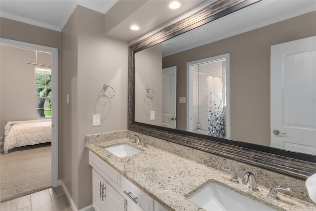 7610 Bantry Cir, Dallas, TX 75248 - bathroom featuring crown molding, double vanity, recessed lighting, a shower with curtain, and baseboards