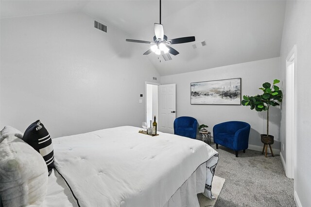 carpeted bedroom with lofted ceiling, baseboards, and ceiling fan