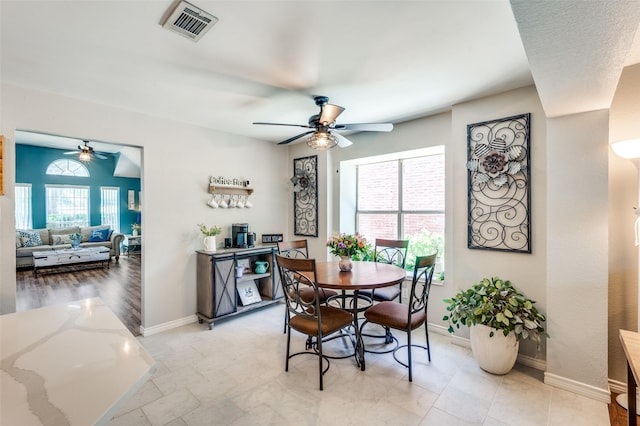 1361 Daffodil Ln, Lewisville, TX 75077 - dining area with ceiling fan and baseboards