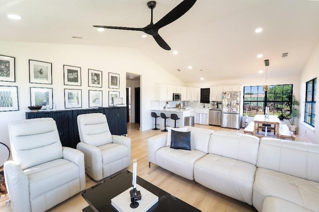 9471 Twin Creeks Cir, Anna, TX 75409 - living area featuring a ceiling fan, light wood-type flooring, recessed lighting, and high vaulted ceiling